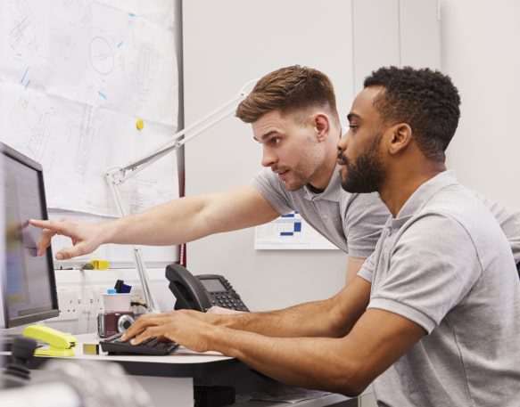 Dat People Brokers Reviewing Computer Screen