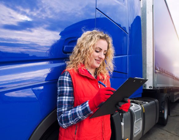 A Truck Driver Fills Out Paperwork