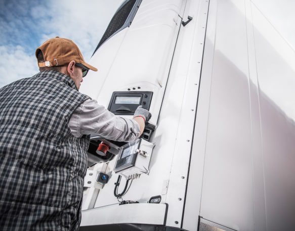 A Trucker Checks His Reefer Min