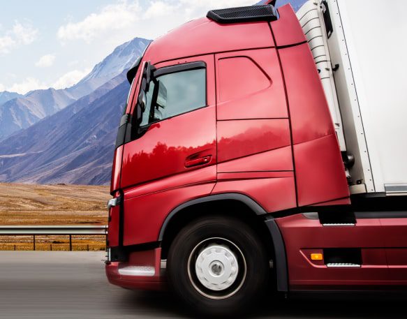 An Otr Trucker Drives Down A Highway Making An Important Delivery Min