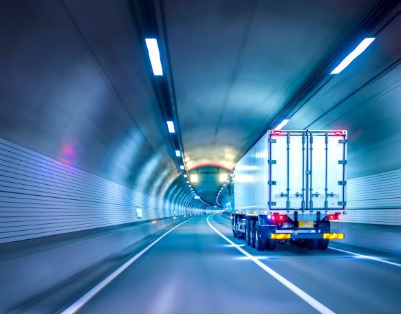 Box Truck Driving Down A Tunnel Min